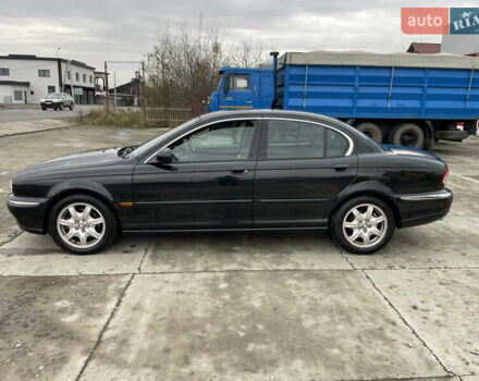 Черный Ягуар Х-Тайп, объемом двигателя 2.5 л и пробегом 142 тыс. км за 4200 $, фото 7 на Automoto.ua