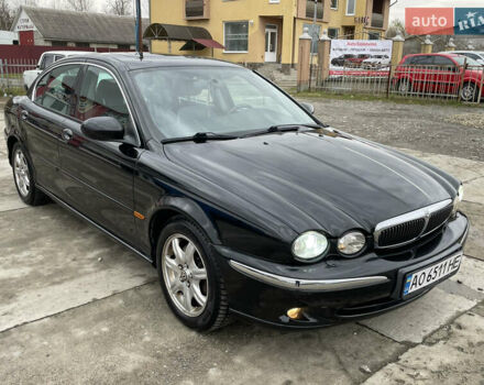 Черный Ягуар Х-Тайп, объемом двигателя 2.5 л и пробегом 142 тыс. км за 4200 $, фото 1 на Automoto.ua