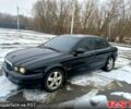 Черный Ягуар Х-Тайп, объемом двигателя 2 л и пробегом 250 тыс. км за 5200 $, фото 1 на Automoto.ua