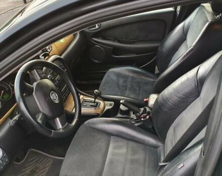 Черный Ягуар Х-Тайп, объемом двигателя 3 л и пробегом 240 тыс. км за 5312 $, фото 4 на Automoto.ua