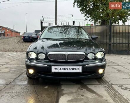 Черный Ягуар Х-Тайп, объемом двигателя 2.5 л и пробегом 174 тыс. км за 5490 $, фото 1 на Automoto.ua