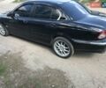 Черный Ягуар Х-Тайп, объемом двигателя 2.5 л и пробегом 165 тыс. км за 5555 $, фото 1 на Automoto.ua