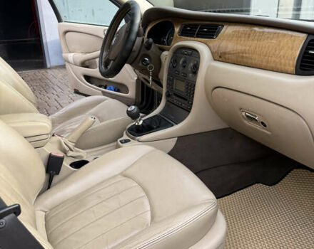 Черный Ягуар Х-Тайп, объемом двигателя 2 л и пробегом 335 тыс. км за 5400 $, фото 12 на Automoto.ua