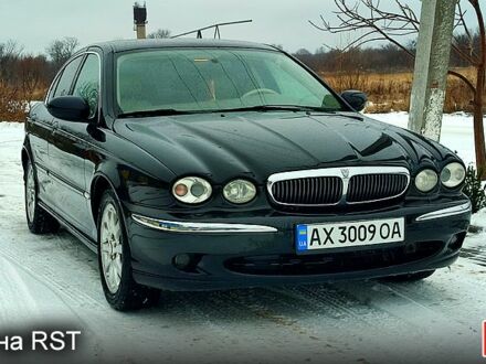 Чорний Ягуар Х-Тайп, об'ємом двигуна 2.5 л та пробігом 354 тис. км за 4300 $, фото 1 на Automoto.ua