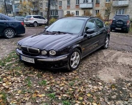 Черный Ягуар Х-Тайп, объемом двигателя 2.5 л и пробегом 294 тыс. км за 4600 $, фото 1 на Automoto.ua