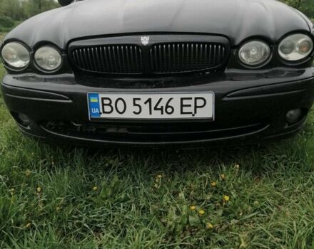 Черный Ягуар Х-Тайп, объемом двигателя 2.5 л и пробегом 300 тыс. км за 3850 $, фото 1 на Automoto.ua