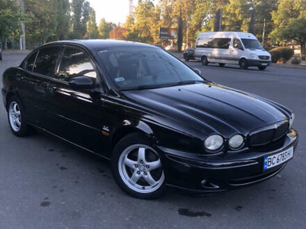 Черный Ягуар Х-Тайп, объемом двигателя 2.97 л и пробегом 360 тыс. км за 5200 $, фото 1 на Automoto.ua