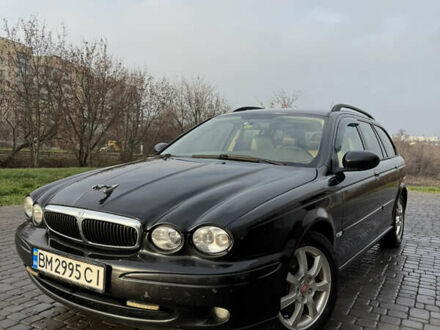 Черный Ягуар Х-Тайп, объемом двигателя 2 л и пробегом 335 тыс. км за 5400 $, фото 1 на Automoto.ua