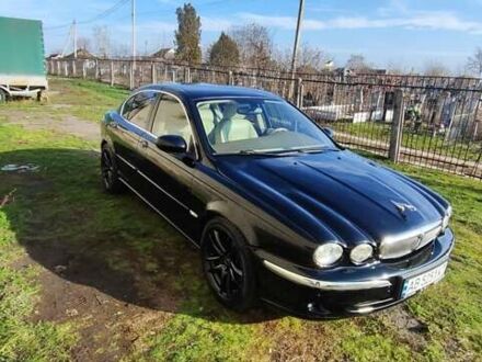 Черный Ягуар Х-Тайп, объемом двигателя 2.97 л и пробегом 135 тыс. км за 5500 $, фото 1 на Automoto.ua