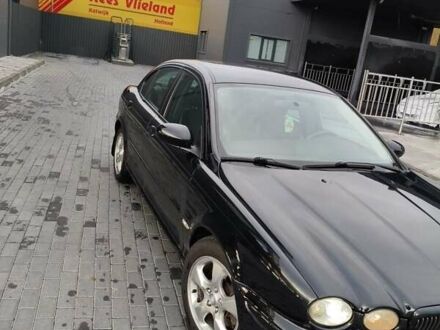 Черный Ягуар Х-Тайп, объемом двигателя 3 л и пробегом 240 тыс. км за 5312 $, фото 1 на Automoto.ua