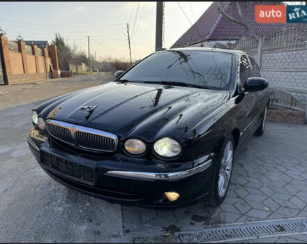 Черный Ягуар Х-Тайп, объемом двигателя 2.5 л и пробегом 155 тыс. км за 6000 $, фото 1 на Automoto.ua