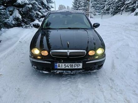 Черный Ягуар Х-Тайп, объемом двигателя 2.1 л и пробегом 286 тыс. км за 2200 $, фото 1 на Automoto.ua