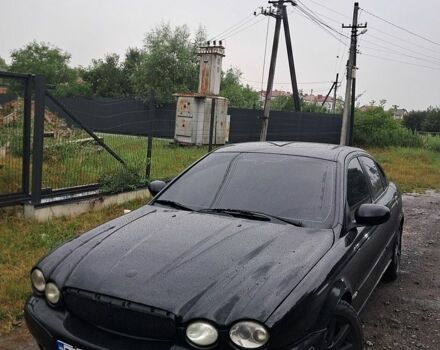Черный Ягуар Х-Тайп, объемом двигателя 2.5 л и пробегом 260 тыс. км за 4300 $, фото 1 на Automoto.ua