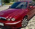 Красный Ягуар Х-Тайп, объемом двигателя 2.5 л и пробегом 200 тыс. км за 3513 $, фото 1 на Automoto.ua