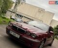 Красный Ягуар Х-Тайп, объемом двигателя 2.5 л и пробегом 470 тыс. км за 3800 $, фото 1 на Automoto.ua