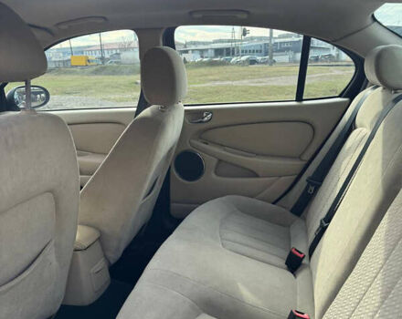 Красный Ягуар Х-Тайп, объемом двигателя 2.1 л и пробегом 197 тыс. км за 6100 $, фото 5 на Automoto.ua