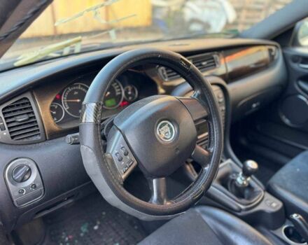 Серый Ягуар Х-Тайп, объемом двигателя 2 л и пробегом 350 тыс. км за 3300 $, фото 6 на Automoto.ua