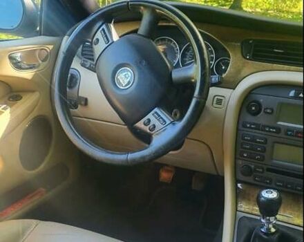 Синий Ягуар Х-Тайп, объемом двигателя 2 л и пробегом 168 тыс. км за 4000 $, фото 6 на Automoto.ua