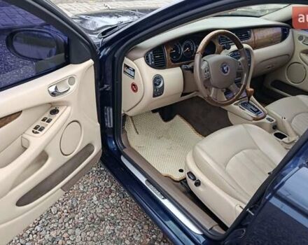 Синий Ягуар Х-Тайп, объемом двигателя 2.5 л и пробегом 114 тыс. км за 6000 $, фото 8 на Automoto.ua