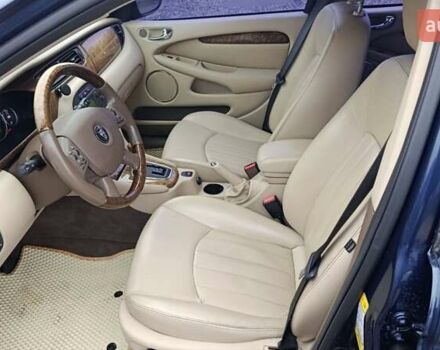 Синий Ягуар Х-Тайп, объемом двигателя 2.5 л и пробегом 114 тыс. км за 6000 $, фото 9 на Automoto.ua