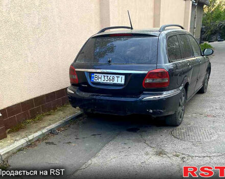 Синий Ягуар Х-Тайп, объемом двигателя 2.2 л и пробегом 358 тыс. км за 3300 $, фото 4 на Automoto.ua