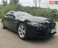 Черный Ягуар XE, объемом двигателя 2 л и пробегом 124 тыс. км за 13900 $, фото 1 на Automoto.ua