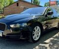 Черный Ягуар XE, объемом двигателя 2 л и пробегом 105 тыс. км за 13900 $, фото 1 на Automoto.ua