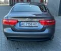 Серый Ягуар XE, объемом двигателя 2 л и пробегом 198 тыс. км за 12800 $, фото 1 на Automoto.ua