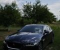 Синий Ягуар XE, объемом двигателя 2 л и пробегом 158 тыс. км за 14800 $, фото 1 на Automoto.ua