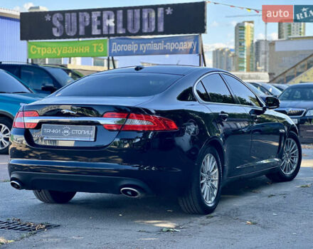 Черный Ягуар ХФ, объемом двигателя 2.97 л и пробегом 202 тыс. км за 9700 $, фото 4 на Automoto.ua