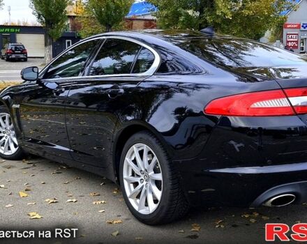 Черный Ягуар ХФ, объемом двигателя 2 л и пробегом 129 тыс. км за 16200 $, фото 1 на Automoto.ua
