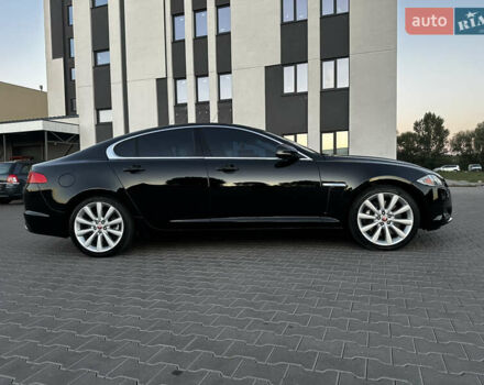 Черный Ягуар ХФ, объемом двигателя 3 л и пробегом 94 тыс. км за 12999 $, фото 4 на Automoto.ua