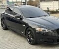 Чорний Ягуар ХФ, об'ємом двигуна 3 л та пробігом 80 тис. км за 17999 $, фото 1 на Automoto.ua