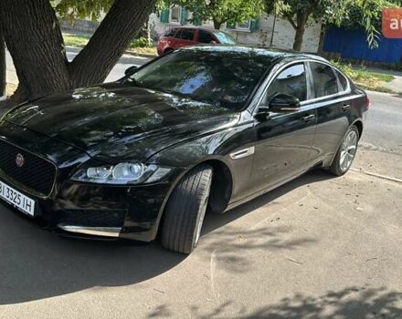 Чорний Ягуар ХФ, об'ємом двигуна 2 л та пробігом 65 тис. км за 17200 $, фото 1 на Automoto.ua