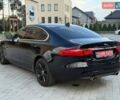 Черный Ягуар ХФ, объемом двигателя 3 л и пробегом 104 тыс. км за 13900 $, фото 1 на Automoto.ua