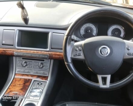 Черный Ягуар ХФ, объемом двигателя 3 л и пробегом 170 тыс. км за 38000 $, фото 3 на Automoto.ua