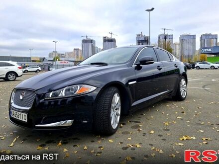 Черный Ягуар ХФ, объемом двигателя 2 л и пробегом 129 тыс. км за 16200 $, фото 1 на Automoto.ua