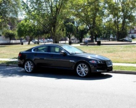 Черный Ягуар ХФ, объемом двигателя 3 л и пробегом 80 тыс. км за 14000 $, фото 1 на Automoto.ua