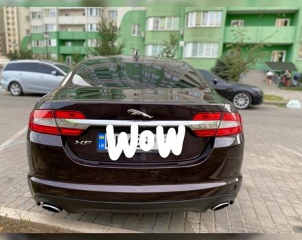 Красный Ягуар ХФ, объемом двигателя 2 л и пробегом 180 тыс. км за 12100 $, фото 1 на Automoto.ua