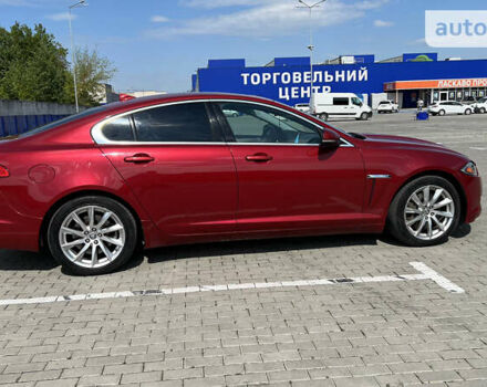 Красный Ягуар ХФ, объемом двигателя 2 л и пробегом 153 тыс. км за 10550 $, фото 3 на Automoto.ua
