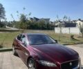 Красный Ягуар ХФ, объемом двигателя 3 л и пробегом 129 тыс. км за 17499 $, фото 1 на Automoto.ua