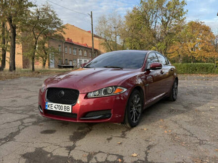 Красный Ягуар ХФ, объемом двигателя 2 л и пробегом 134 тыс. км за 12500 $, фото 1 на Automoto.ua