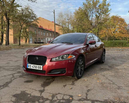 Красный Ягуар ХФ, объемом двигателя 2 л и пробегом 134 тыс. км за 12500 $, фото 1 на Automoto.ua