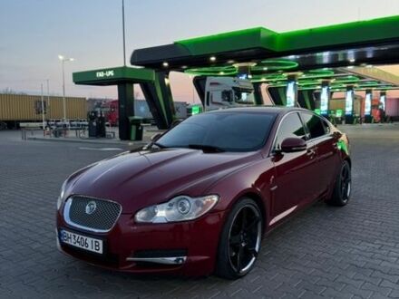 Красный Ягуар ХФ, объемом двигателя 3 л и пробегом 86 тыс. км за 9900 $, фото 1 на Automoto.ua