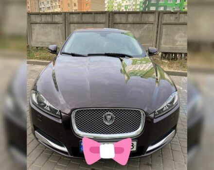 Красный Ягуар ХФ, объемом двигателя 2 л и пробегом 180 тыс. км за 12100 $, фото 1 на Automoto.ua