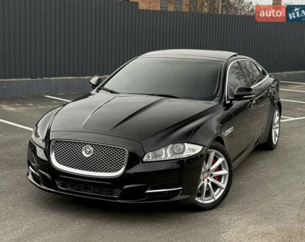 Черный Ягуар Икс Джей, объемом двигателя 5 л и пробегом 125 тыс. км за 20500 $, фото 1 на Automoto.ua