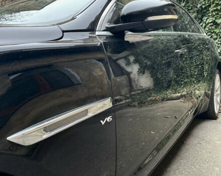 Черный Ягуар Икс Джей, объемом двигателя 3 л и пробегом 90 тыс. км за 28000 $, фото 1 на Automoto.ua