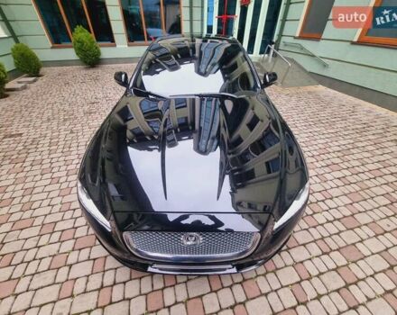 Черный Ягуар Икс Джей, объемом двигателя 5 л и пробегом 127 тыс. км за 26000 $, фото 1 на Automoto.ua