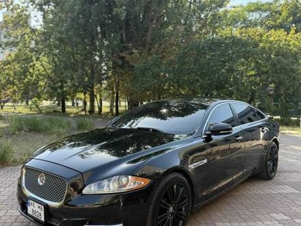 Черный Ягуар Икс Джей, объемом двигателя 3 л и пробегом 145 тыс. км за 18828 $, фото 1 на Automoto.ua
