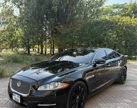 Черный Ягуар Икс Джей, объемом двигателя 3 л и пробегом 145 тыс. км за 18828 $, фото 1 на Automoto.ua